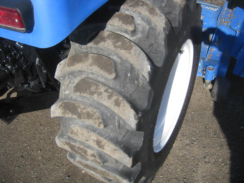 Tractors - Compact  New Holland T1030 Tractor  Photo